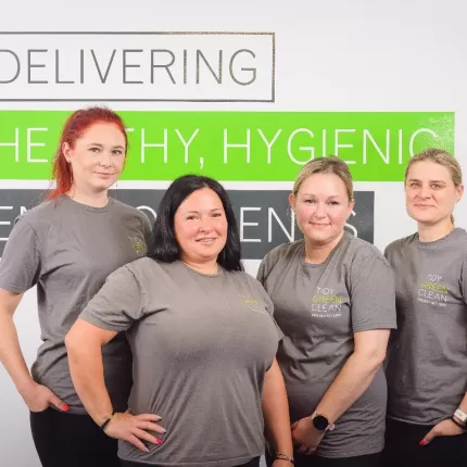 Tidy Green team photo of 4 people in uniform