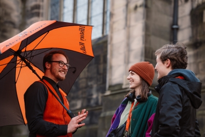 A Mercat Employee speaks to customers