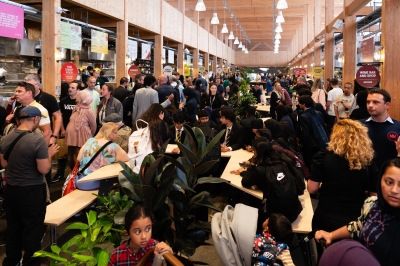 Image of several people inside one of Mercato Metropolitano's food halls